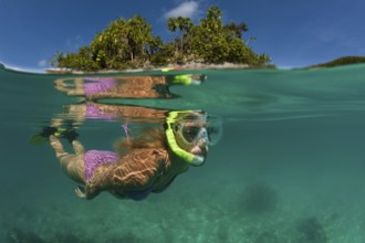 Woman snorkelling in Palau, Micronesia, Palau