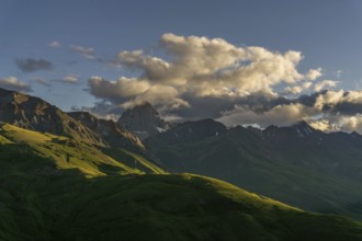 Beautiful sunset in mountains and clouds, Caucasus, Russia