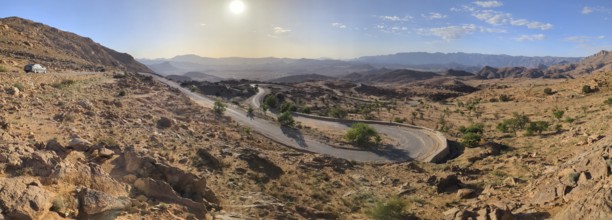 A road winding up a mountain in a great mountain landscape in the Anti-Atlas, Morocco