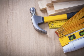 Variety of working building tools on wood board horizontal version construction concept