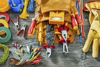 Very big set tools of electrical tools on vintage wooden background