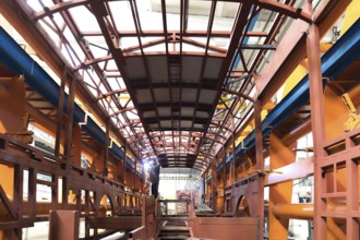 One working day of modern automatic bus trolleybus car production with unfinished cars workers in