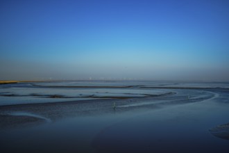Tranquil waterscape with minimalist horizon under a blue sky, 9688 TN Drieborg, Dollart,