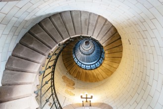 Penmarch, France, August 2, 2018: Spiral staircase in Eckmuhl Lighthouse in Brittany. Directly