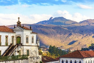 Baroque church and mountains in the city of Ouro Preto in Minas Gerais with the mountains and peak
