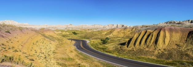 Fascinating colorful hills along the road leading through Badlands National Park, USA