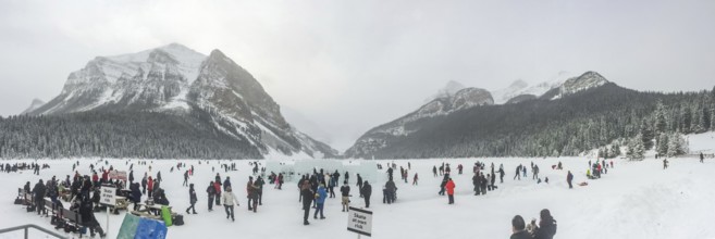 Lake Louise, Alberta, Canada. Jan 29, 2024. A panoramic scene capturing individuals engaged in ice