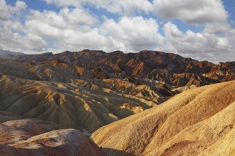 The famous section of Death Valley in California - Zabriskie Point. Magically beautiful sunset