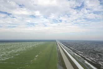 Grain field covered by snow in spring Aerial View