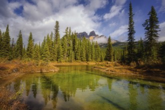 Beautiful autumn landscape scene in lake and mountain in background in west Canada