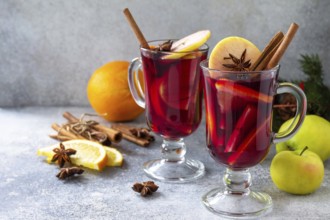 Christmas mulled wine, winter alcoholic drink. Two glass of mulled wine (gluhwein) and its