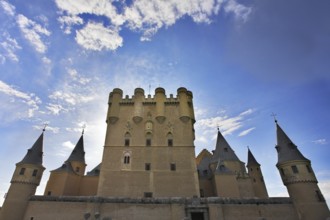 Medieval Spanish palace on a background of a spring sunset