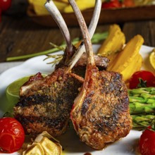 Lamb shanks marinated in herbs with green asparagus and lime