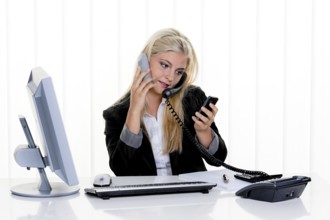 Young woman with problems and stress in the office. Austria