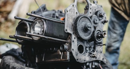 Detailed view of a disassembled engine with visible gears and components