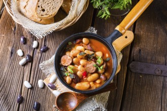Delicious bean stew with sausage and potato