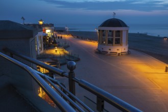 Seaside walk in Borkum town at night with Music Pavilion and lights. Seaside walk in Borkum town at