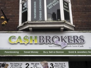 Chester. Cheshire, United Kingdom, 20 March 2024 : Sign above a cashbrokers pawn brokers and