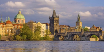 Charles Bridge (Karluv Most) on Vltava river and Old Town Bridge Tower, famous tourist destination