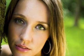 Young beautiful lady relaxing in the park
