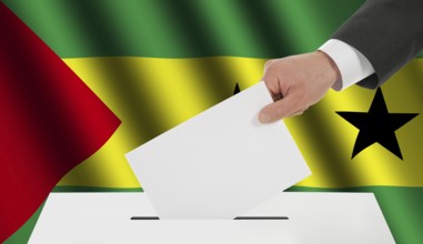 The São Tomé and Príncipe flag and the hand with the bulletin about the ballot box