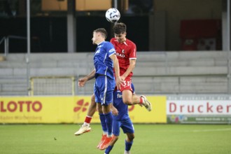 Header duel against Rico Wehrle (Bahlinger SC /BSC) and Karl Steinmann (SC Freiburg II / U23)