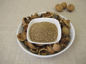 Brown granules of walnut shells, ground nutshells