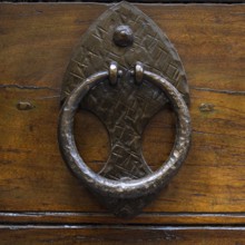 Close up of rustic old door in Spoleto, Italy