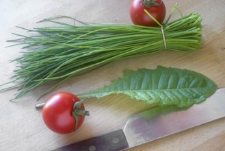 Chives on a chopping board