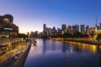 MELBOURNE, AUSTRALIA - OCTOBER 10, 2024: Melbourne skyline from Princes Bridge in Southbank along