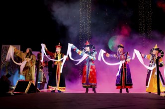 ULAN-UDE, RUSSIA - OCTOBER 29: Asian models demonstrate a dresses in ethnic style at the