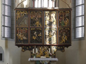 Historic altar in the incident sunlight: St Marien Borna Church. Saxony, Germany