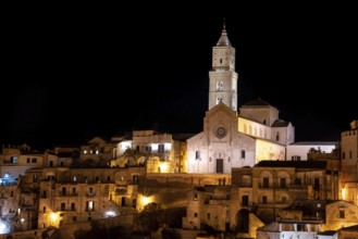 Scenic illuminated cathedral of Matera at night, Italy
