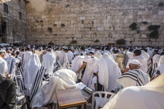 Blessing of the Cohenim in Passover. Jerusalem, Israel. Jews praying at the Western Wall wrapped in