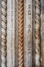 Door details of the columns of the Basilica of Santa Maria Maggiore. Bergamo, Italy.