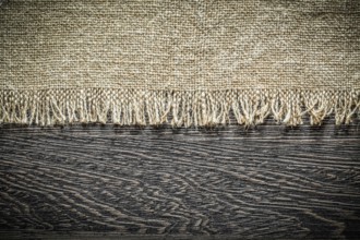 Vintage hessian on wooden board