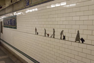 Art at the wall of subway station Prince Street in New York, USA