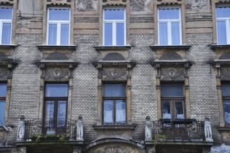 Weathered Art Nouveau façade in Krakow