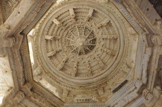 Ranakpur Temple, Ranakpur, Rajasthan, detail of an elaborately chiselled stone ceiling with complex