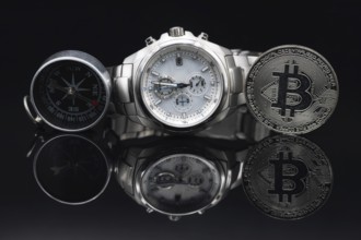 Solid men's wristwatch with a chronometer in a titanium case and a gift coin Bitcoin