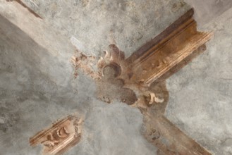 Antique ceiling of a church decorated with fresco vaulted