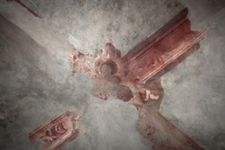 Antique ceiling of a church decorated with fresco vaulted