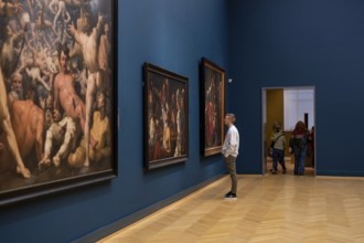 Copenhagen, Denmark, January 20, 2024: A visitor looking at paintings inside the National Gallery