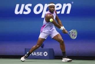 Tennis player Frances Tiafoe in action at the US Open 2024 Championships, Billie Jean King Tennis