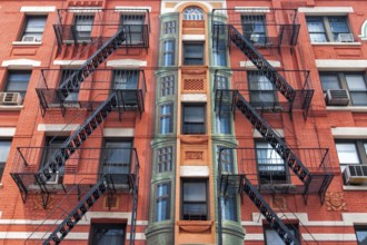 The typical old houses with fire stairs in New York in USA
