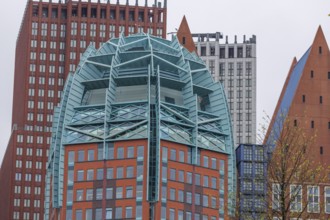 Detailed view of a modern skyscraper with a unique design, surrounded by other buildings in The