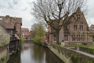 View of Bruges canal with historic houses, Belgium