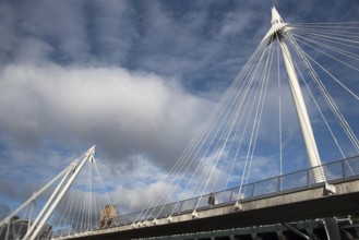 The famous historic Hungerford suspension Bridge crossing the river Thames in London city, United