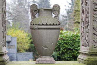 Amphora as a grave decoration on a gravestone at the Melaten cemetery in Cologne