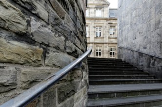 Staircase passage with railings in the historic city centre of Cologne